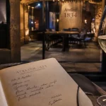 Atelier 1834 - Champagne Boizel : carnet de dégustation et verre en cave